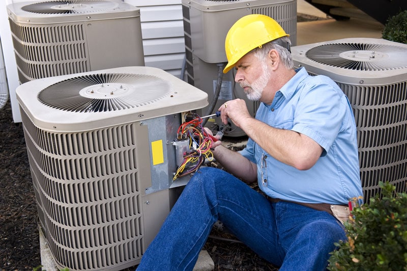 Air Conditioning Repairman at Work — Air Conditioning Professionals in Taree, NSW